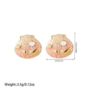 Detailed view of scallop shell earrings with pink enamel, pearl and sea star motifs