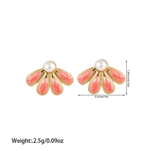 Macro shot of fan-shaped stud earrings with pink marble enamel and pearl details
