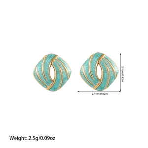Diamond geometric stud earrings with light blue enamel and gold trim details