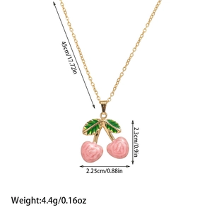 Detail showing pink rose cherry pendant with green enamel leaves on golden necklace