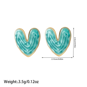 Detailed view of heart studs featuring green marble texture and gold plated edges