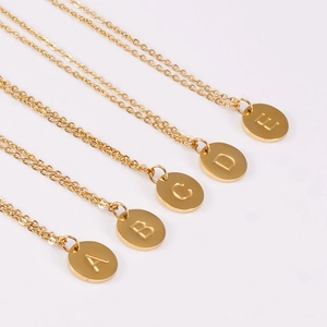 Minimalist 18K gold plated stainless steel necklaces with oval initial letter pendants