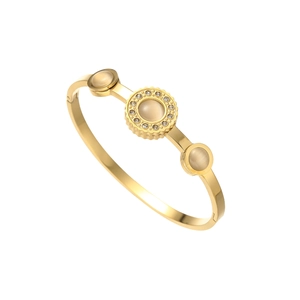 Elegant gold-plated clover bracelet with micro-pave diamonds and beige cat eye stone