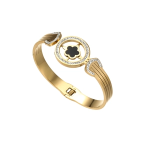Gold plated stainless steel clover bangle with black floral inlay and micro-pave crystals