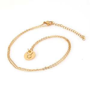Minimalist gold hollow Taurus constellation necklace with circular pendant on white background