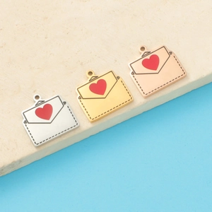 Polished envelope pendants in silver gold and rose gold with red heart and hanging hole