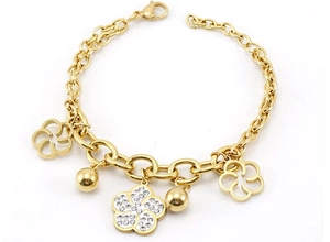 Detail of 18K gold stainless steel rose bracelet featuring crystal charms and lobster clasp