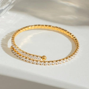 Double-layered gold stainless steel wrap bracelet with white cubic zirconia pavé