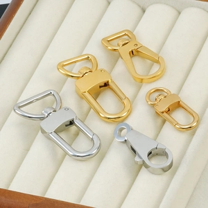 Golden and silver stainless steel swivel snap hooks and lobster clasps for bags