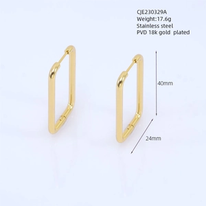 Macro view of gold rectangle geometric hoop earrings with precise dimensions and weight