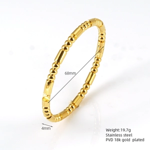 Detailed macro of 18k gold plated stainless steel bamboo bracelet with dimensions