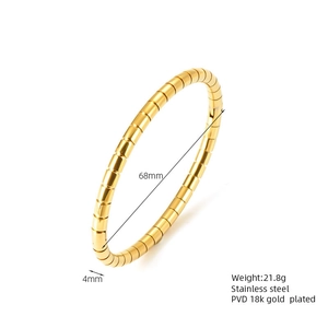 Close-up of bamboo style gold plated stainless steel bracelet with 68mm diameter detail