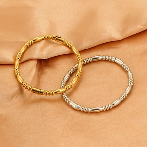 Polished stainless steel bamboo link bracelets in 18K gold and silver finishes