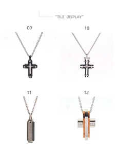 Detail view of high-grade stainless steel cross pendants with black plating and diamond accents