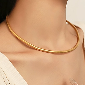 Minimalist 18K gold-plated stainless steel choker necklace shown on female neck