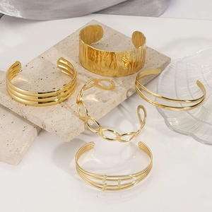 Set of 5 minimalist gold plated stainless steel open bangles with textured finish