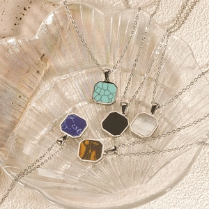 Set of five stainless steel geometric necklaces with colorful marble stone pendants