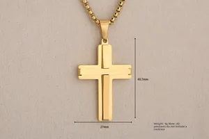 Detailed view of 40.7mm x 27mm gold cross pendant with layered brushed metal texture