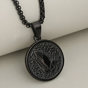 Vintage stainless steel round coin pendant necklace featuring 3D praying hands relief