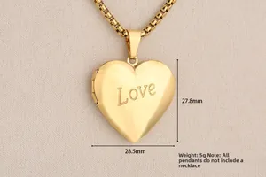 Detail view of gold heart locket pendant with Love engraving and size measurements