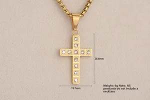 Detailed view of gold stainless steel cross pendant with cubic zirconia inlay and dimensions