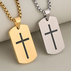 Polished silver and gold dog tag necklaces with black cross pendants on box chains