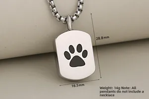 Detailed view of paw print urn pendant for pet ashes with 28.8mm by 16.5mm dimensions