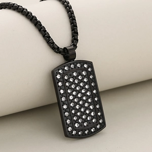 Luxurious black stainless steel dog tag pendant with rows of sparkling white crystals