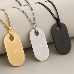 Dog tag kettingen met kruis en Onze Vader gravure in goud, zilver en zwarte uitvoeringen