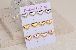 Set of 12 heart-shaped stainless steel studs in gold, silver, and rose gold colors