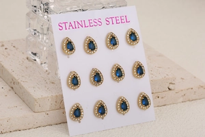 Detail of 6 pairs of teardrop blue stone earrings with rhinestones on stainless steel