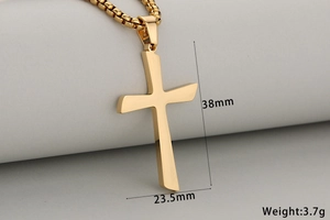 Close-up of minimalist gold cross pendant with dimensions 38mm by 23.5mm and weight 3.7g