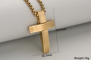 Detail view of gold stainless steel cross pendant showing 39.5mm length and brushed finish