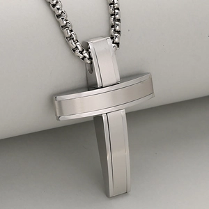 Men's stainless steel cross pendant necklace with brushed and polished metal finishes