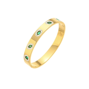 Gold plated stainless steel bangle featuring green oval gemstones with halo diamonds