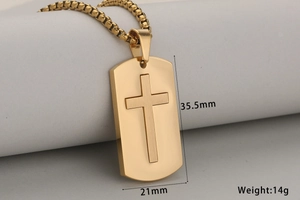 Detail of gold stainless steel cross pendant with dimensions 35.5mm by 21mm