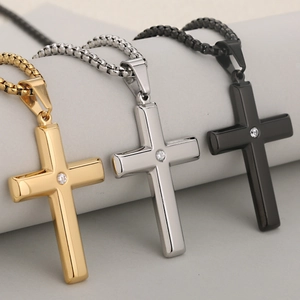 Polished stainless steel cross necklaces in gold, silver, and black with a center diamond