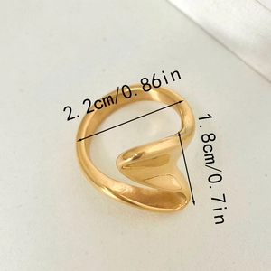 Modern 304 stainless steel chunky irregular wave ring with a polished golden finish