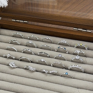 Elegant 20-piece silver ring set with zircon stars and leaves in a gray velvet display box