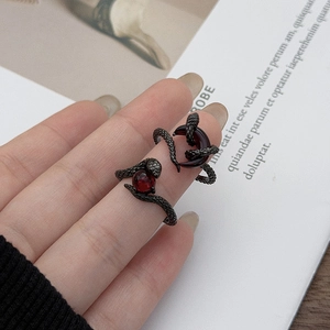 Gothic gun black snake rings set with deep red crystal and crescent moon details