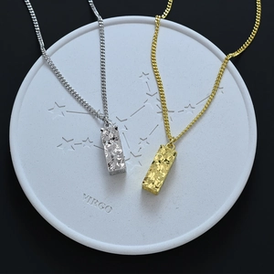 Minimalist hammer-textured rectangle pendant necklace in gold and silver finish