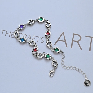S925 silver cross bracelet featuring colorful enamel links and adjustable lobster clasp