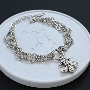 Retro S925 silver fleur-de-lis charm bracelet with double rope chain and zircon details