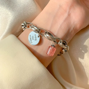 Silver chain bracelet with engraved round disc and pink strawberry crystal charm
