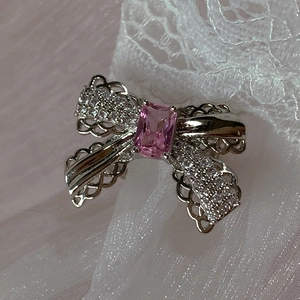 Pink zircon bow ear cuff earring with hollow silver wings and sparkling crystals