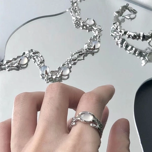 Irregular liquid silver ring and necklace set with oval translucent opal gemstone