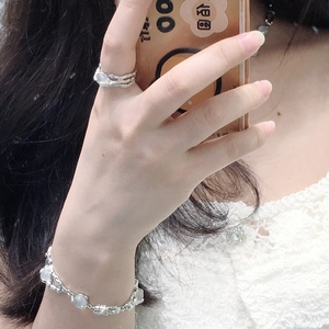 Irregular silver opal ring and matching bracelet set in French minimalist design style