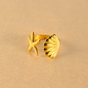 Anello regolabile in acciaio inossidabile dorato con motivi marini di stella e conchiglia