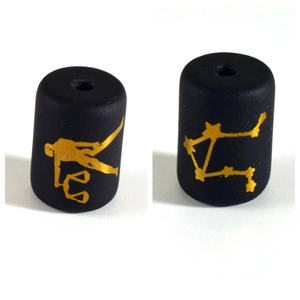 Detail of matte black Libra zodiac bead with golden symbol for DIY jewelry making
