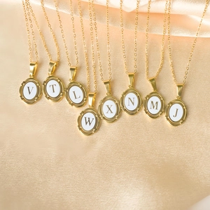 Elegant gold-plated stainless steel oval alphabet necklaces with white enamel inlay for women